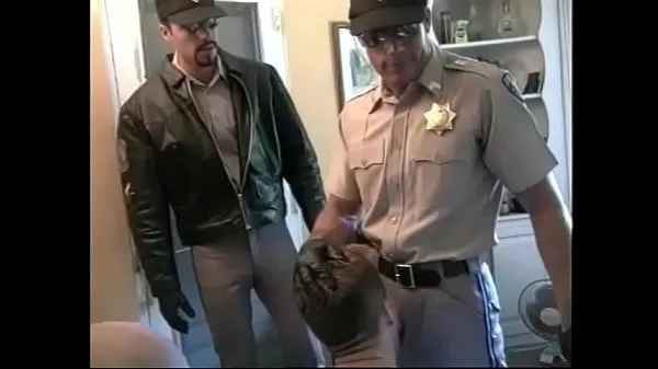 Randy policeman sucking and fucking threesome