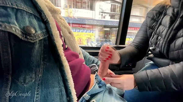 She tried her first Footjob and give a sloppy Handjob - very risky in a public sightseeing bus :P
