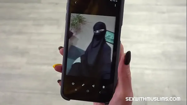 مقاطع محرك الأقراص عالية الدقة Woman in niqab makes sexy photos